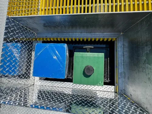 Top deck forward view over yellow grating toward cab roof.